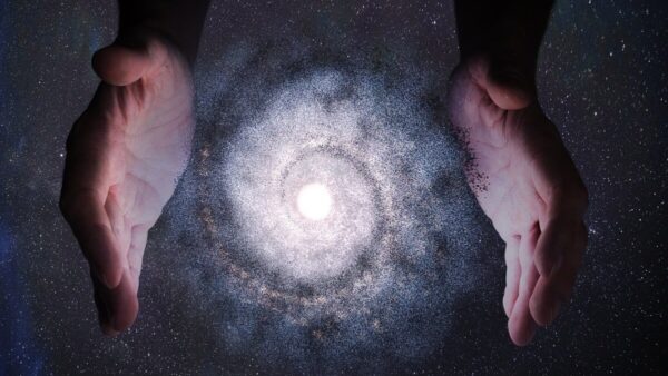 Concept of creationism - hands creating the universe
